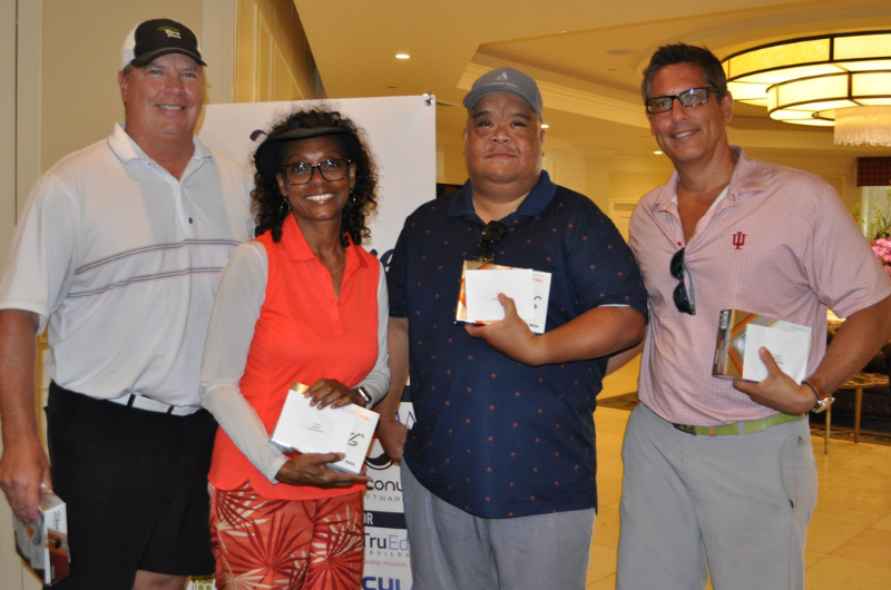 The first-place team at this year's 13th annual Multi-Network Golf Tournament.