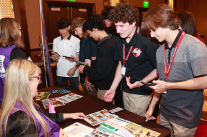 Local high school students participate in a “Bite of Reality” event during REACH 2023.