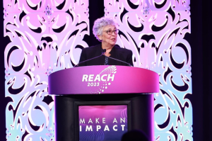Diana Dykstra, President and CEO of the California and Nevada Credit Union Leagues, addresses the opening general session at REACH 2023.
