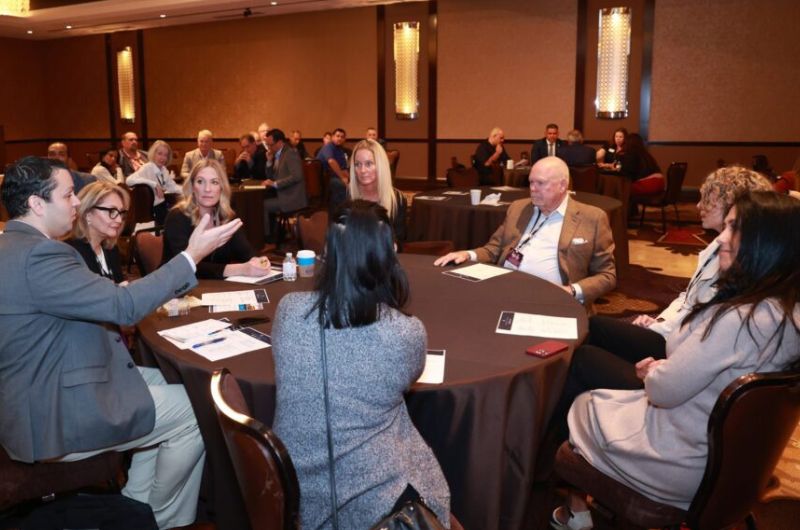 Attendees of REACH 2023 meet up to discuss important credit union advocacy topics.